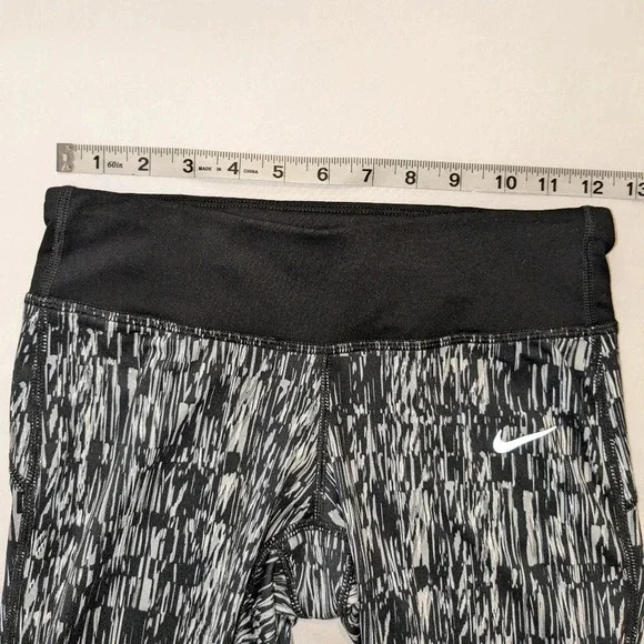 Nike women's graphic DRI-FIT tight running Capri leggings, size XS , black/white - Picture 7 of 10
